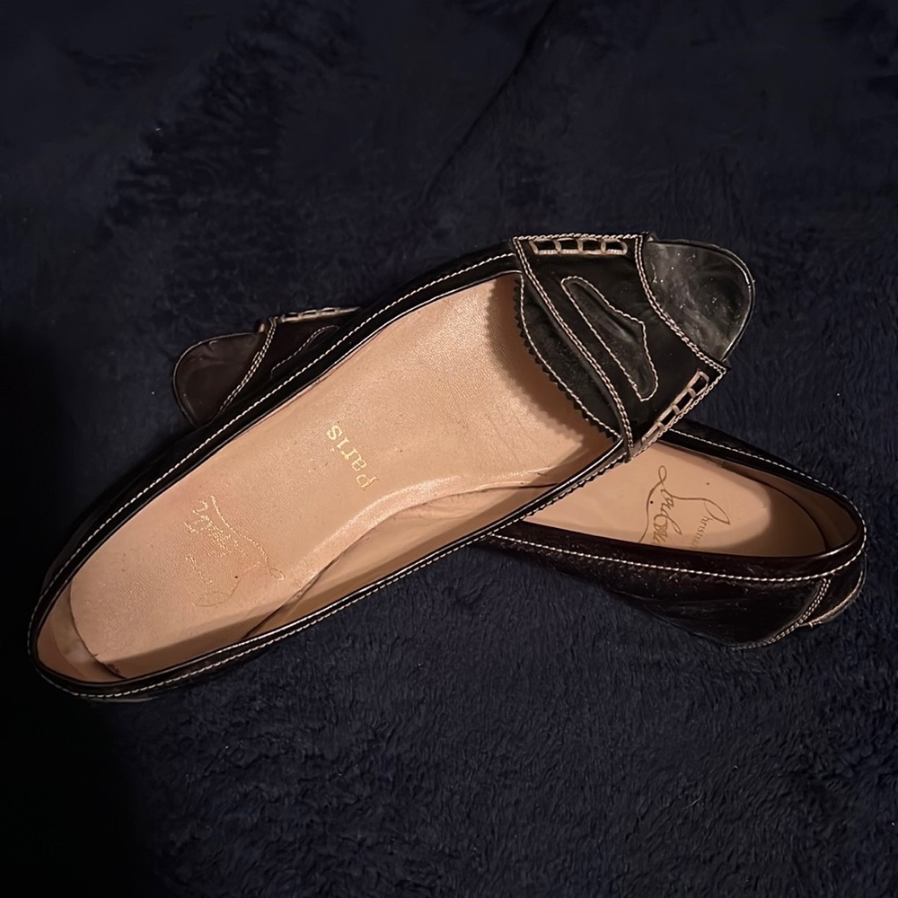 Christian Louboutin black slip on shoes red soles